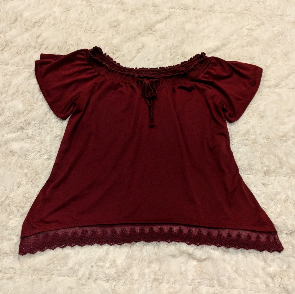 Flowy blouse with cute lace detail on bottom